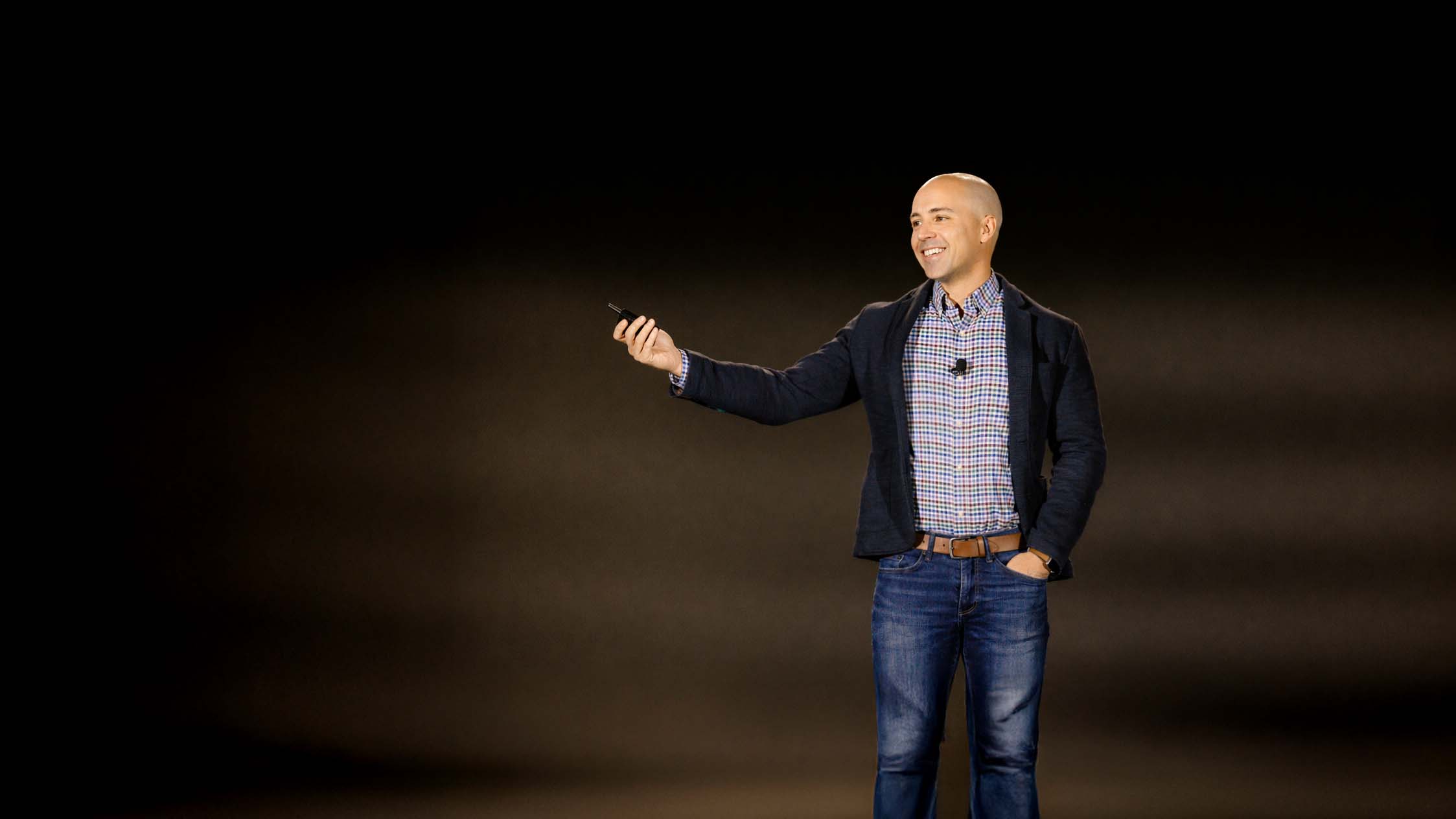Tim Woodring speaking on stage